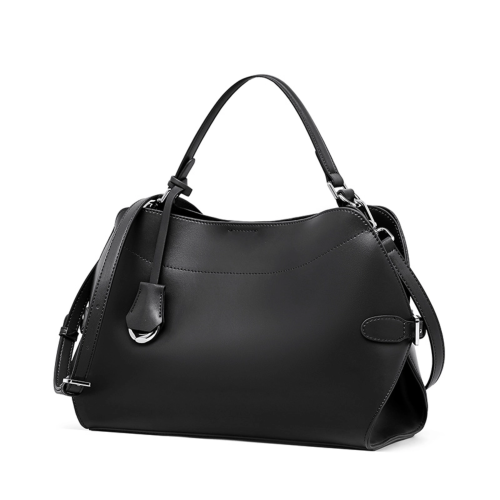 Czarna skórzana torebka damska z naturalnej skóry bydlęcej. Rączka, regulowany pasek, wnętrze z kieszeniami i wyjmowaną saszetką. Do ręki, na ramię i crossbody.